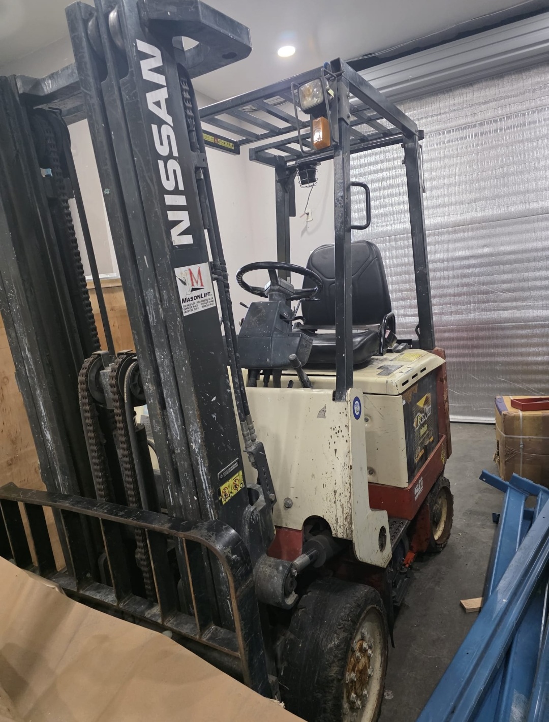 Machine removal company collecting large commercial equipment near Richmond